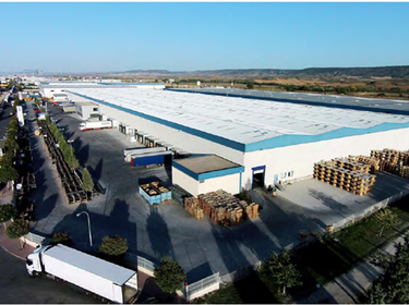 Exterior aerial shot of Prologis Azuqueca DC2 with trucks parked in the truck court